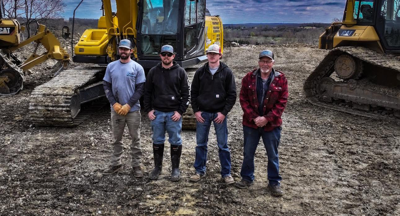 Winkler Land Management excavation crew and heavy equipment on a Henry County, MO job site