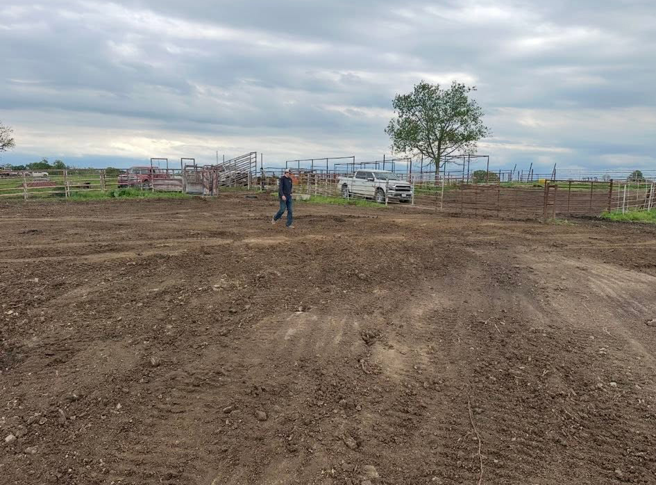 Dozer tracks across freshly graded soil on a Windsor, MO job site