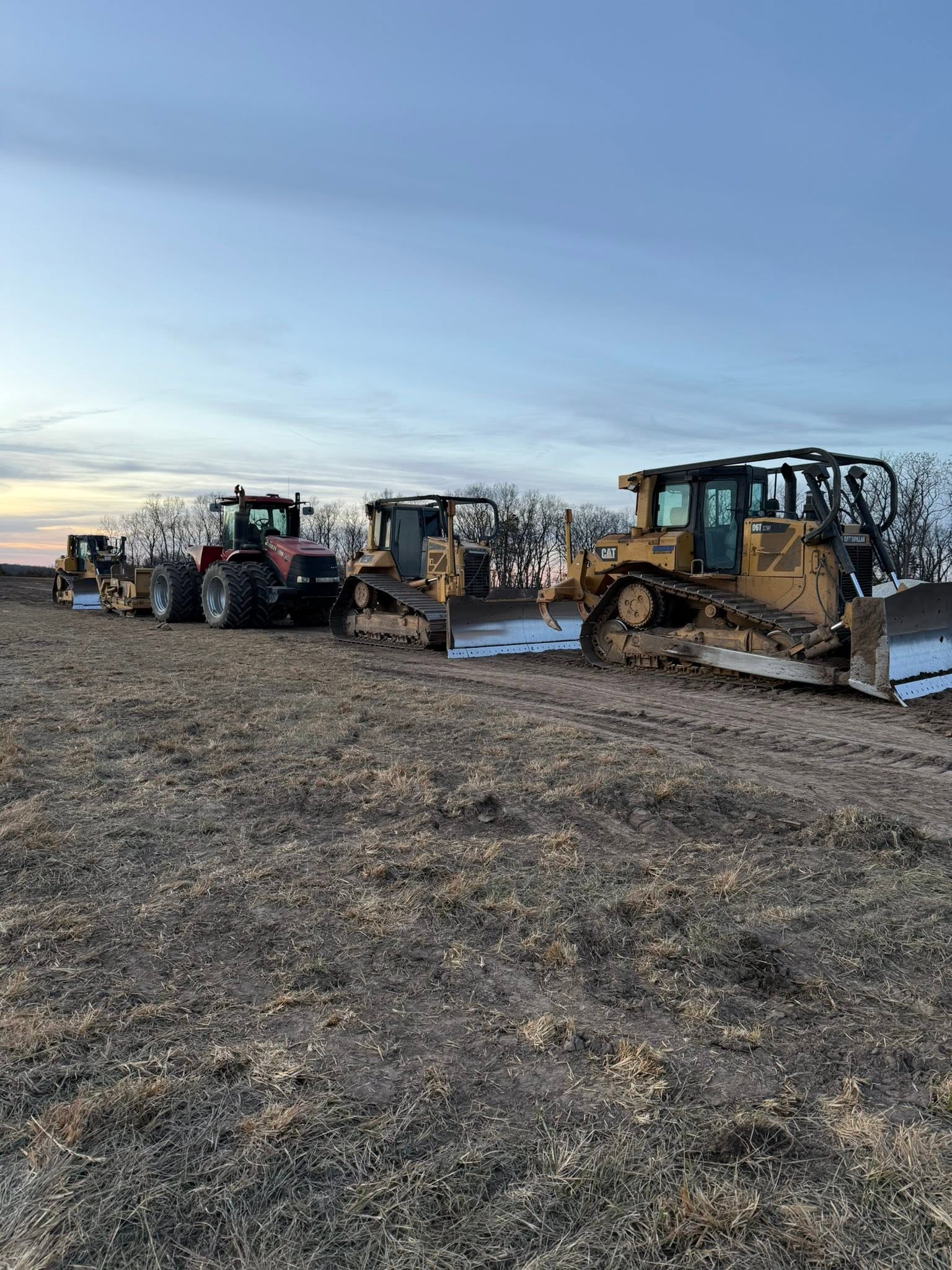 Land clearing crew and machinery serving Henry County, MO